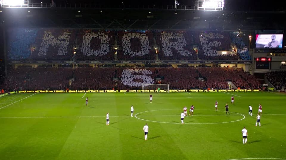 Bobby Moore - West Ham fans display Moore and 6 as a tribute to Bobby Moore twenty years after his death, in the stand which bears his name, at The Boleyn Ground, London