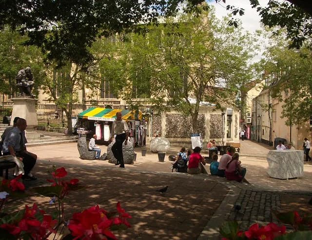 Thomas Browne - Lunchtime in the city Office workers and others taking a break in this square next to St Peter Mancroft church.
The sculpture by Anne and Patrick Poitier which provides some of the sea
