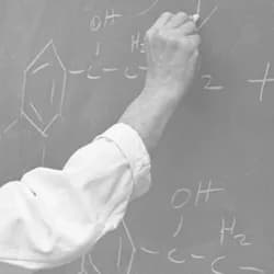 Julius Axelrod - Julius Axelrod at the blackboard. March 1973.  Photo from the National Library of Medicine   http://profiles.nlm.nih.gov/HH/Views/Exhibit/narrative/neurotransmitters.html