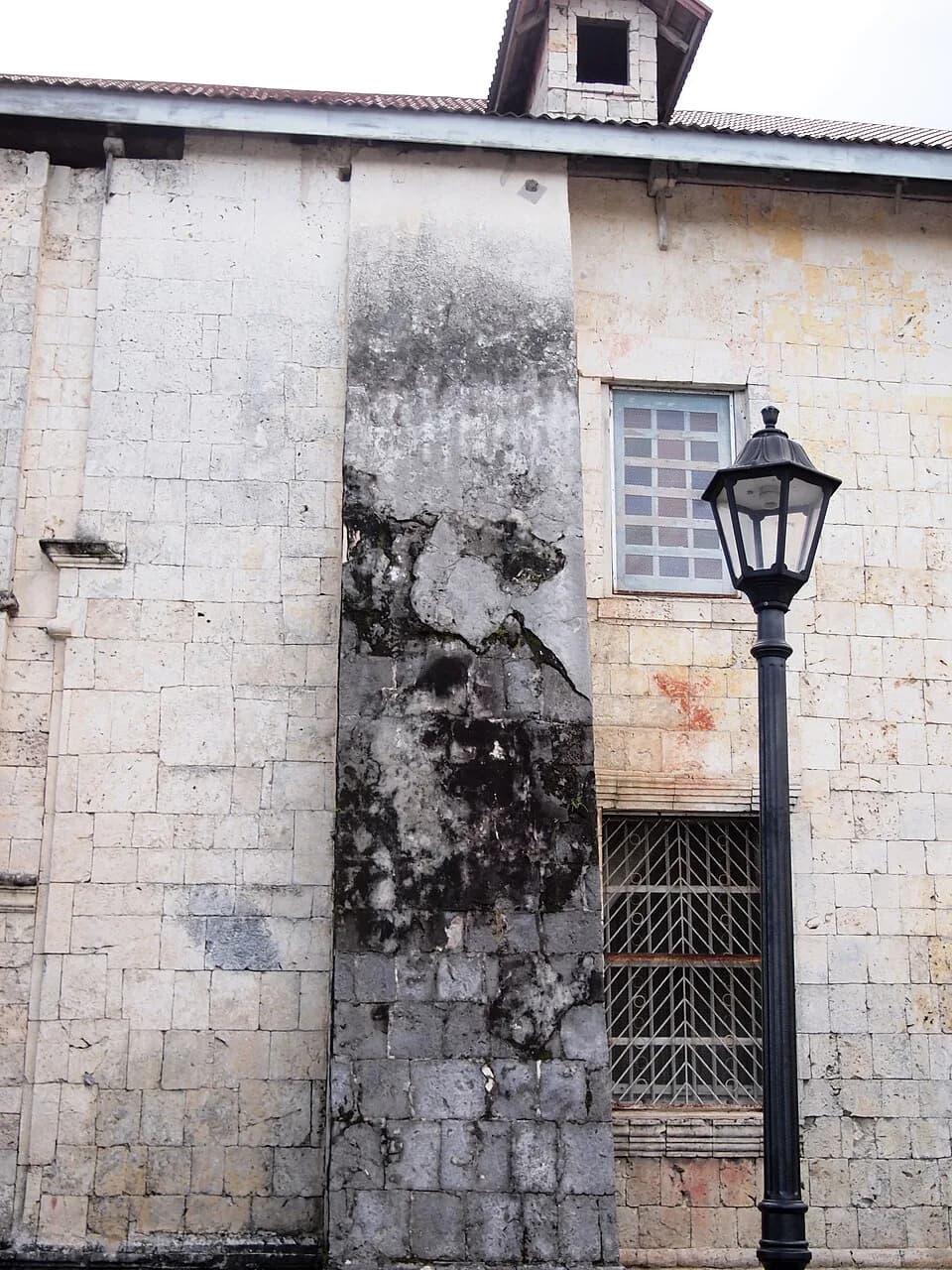 Padre Pio - A famous spot in the Baclayon Church compound is this wall on which locals claim an image of Padre Pio mysteriously appeared.