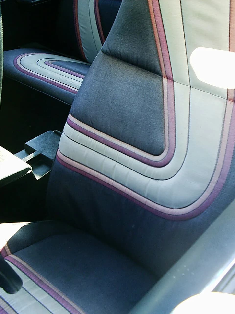 Pierre Cardin - Pictured is the driver's seat in the 1972 AMC Javelin SST. Visible is also part of the rear seat with the matching fabric and design. This upholstery came with the optional Pierre Card