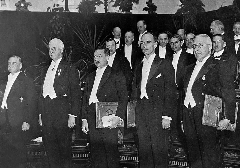 Otto Loewi - King of Sweden presents Nobel prizes in Stockholm.

Prof Otto Loewi,  Sir Henry  Dale,   Prof. Peter Debye, Dr. C.D. Anderson, Prof. Hess