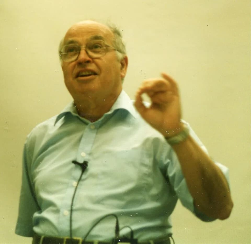 Michael Atiyah - Michael Francis Atiyah at a 1996 Chern symposium, named after Shiing-Shen Chern, in Berkeley, California (maybe UC Berkeley); portion enlarged and then re-scanned