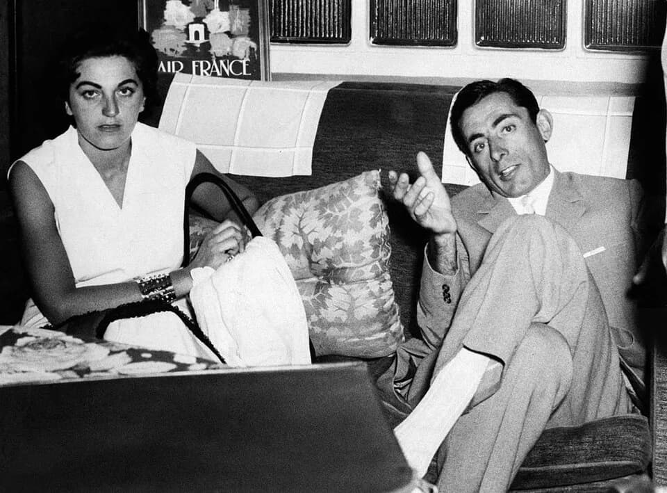 Fausto Coppi - Giulia Occhini (known as Dama Bianca) and Italian racing cyclist Fausto Coppi sitting on a sofa. Turin, 16th July 1954.