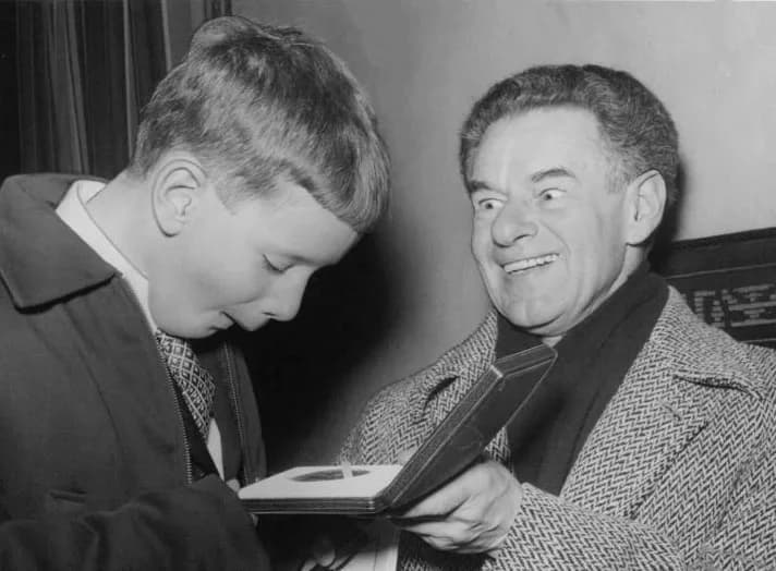 Fritz Albert Lipmann - The 1953 Nobel Peace Prize. Fritz Lipmann shows his medal for his son Stephen