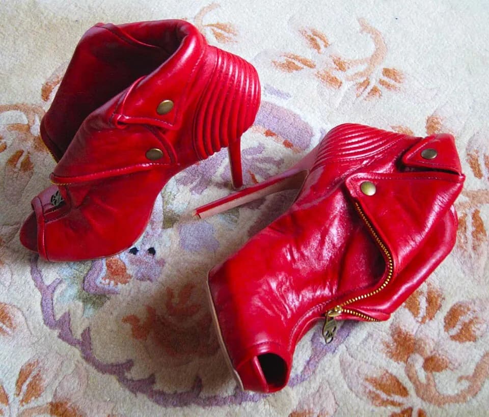 Alexander McQueen - These are well worn Alexander McQueen Faithful boots that represent current high end fetish tastes in fetish shoes.