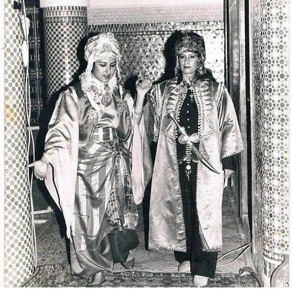 Fatema Mernissi - The Moroccan sociologist and writer Fatima Mernissi, accompanied by the Moroccan screenwriter and university professor Fatima Chebchoub, wear a Moroccan Caftan, the one on the right 