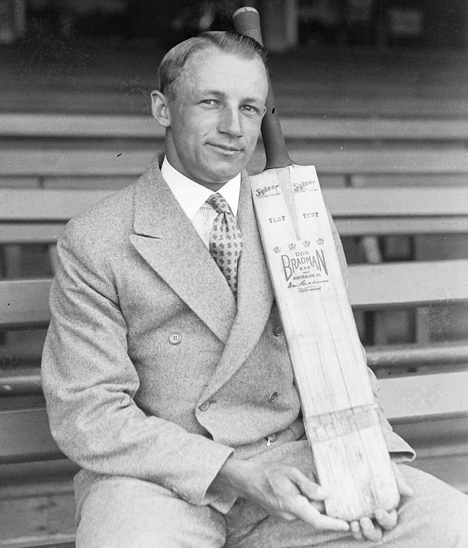 Don Bradman - Portrait Don Bradman with his "Don Bradman" brand Sykes bat, Sydney,  1932, Sam Hood, vintage glass negative, State Library of New South Wales ON4/2389