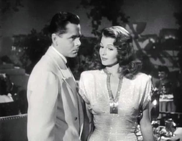 Glenn Ford - Screenshot of Glenn Ford and Rita Hayworth as Gilda in the trailer for the film Gilda