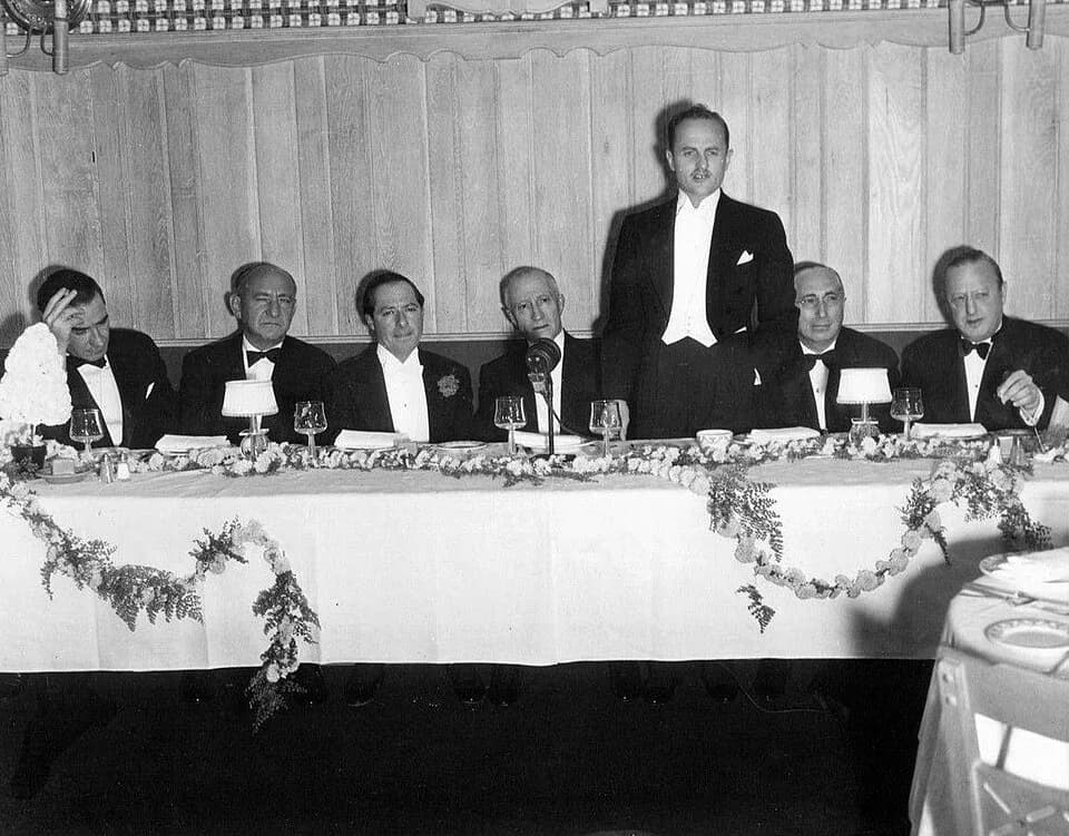 Frank Lloyd - Photo of a dinner given by the motion picture industry to mark Adolph Zukor's 25th anniversary in the industry.  The event was held at The Trocadero in 1936.  From left-Frank Lloyd, Joe 