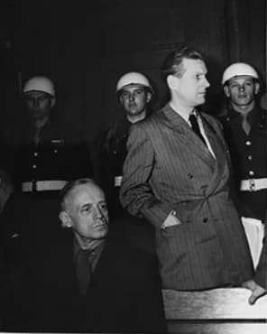 Baldur von Schirach - Joachim von Ribbentrop (sitting), former Foreign Minister, and Baldur von Schirach (standing), former leader of the Hitler Youth, during a recess at the International Military Tr
