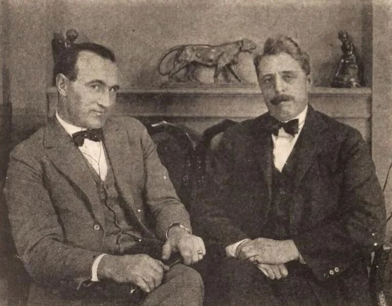 Arnold Bennett - Director Donald Crisp and author Arnold Bennett at the Famous Players-Lasky studio in London, on page 44 of the January 29, 1921 Exhibitors Herald.