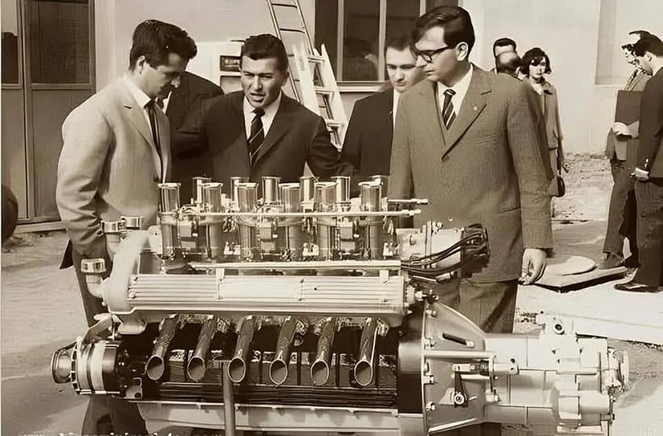 Ferruccio Lamborghini - From left to right: Giotto Bizzarrini, Ferruccio Lamborghini and Gian Paolo Dallara at Sant'Agata Bolognese in 1963, with a Lamborghini V12 engine prototype.