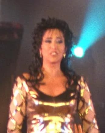 Ofra Haza - SINGER OFRA HAZA AT THE JUBILEE CHIMES PERFORMANCE AT GIVAT RAM, JERUSALEM, IN HONOR OF THE 50TH  INDEPENDENCE DAY OF THE STATE OF ISRAEL.
הזמרת עופרה חזה מופיעה בחגיגות היובל בגבעת רם, יר