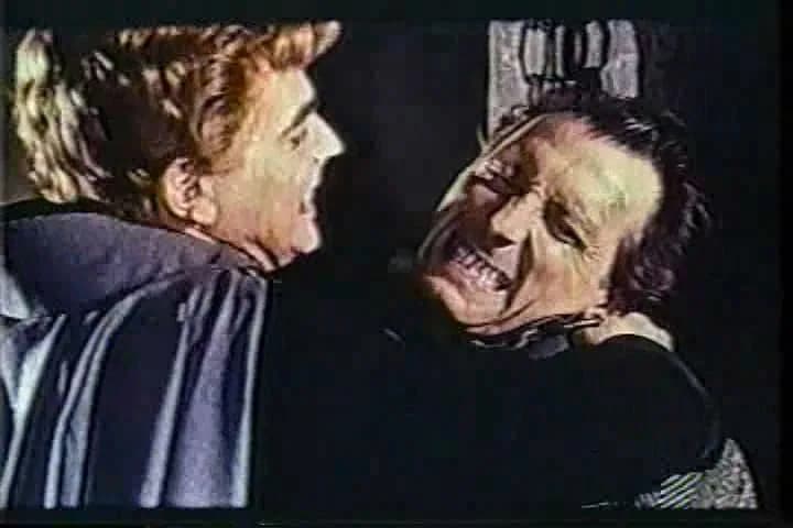 Peter Cushing - Screenshot of Peter Cushing and David Peel from the trailer for the film The Brides Of Dracula