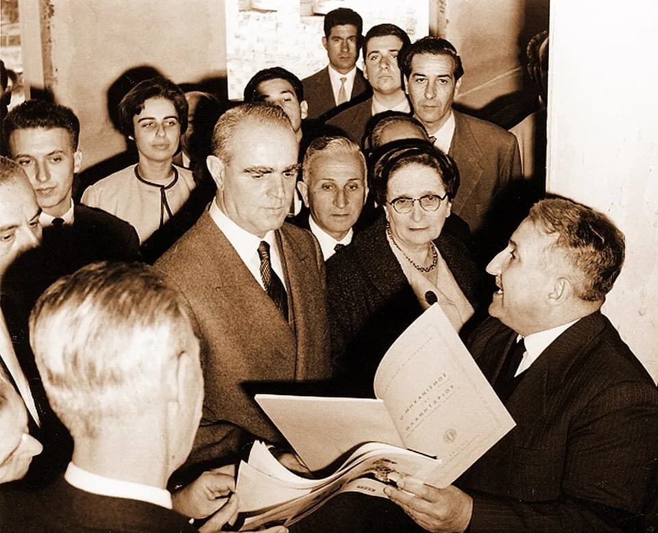 Konstantinos Karamanlis - In 1962 Konstantinos Karamanlis, Prime Minister of Greece, inspects the plans for the building of the Eugenides Planetarium presented by Professor Demetrios Kotsakis. Between