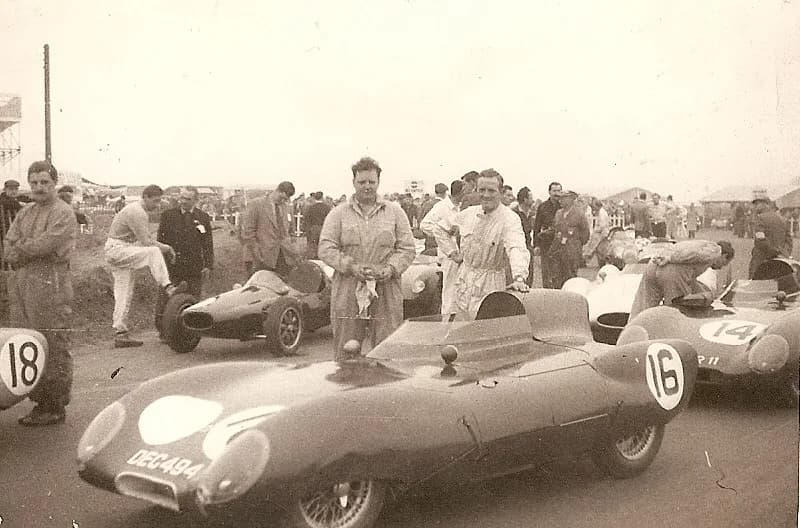 Graham Hill - Lotus Elevens. Driver Cliff Allison. John Crosthwaite with oily rag. Graham Hill on left.