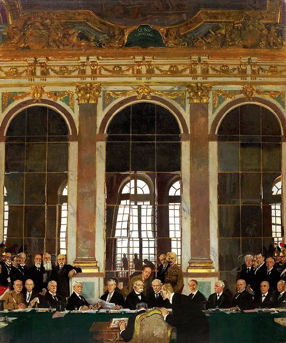 Hermann Müller - A view of the interior of the Hall of Mirrors at Versailles, with the heads of state sitting and standing before a long table.
Front Row: Dr Johannes Bell (Germany) signing with Herr