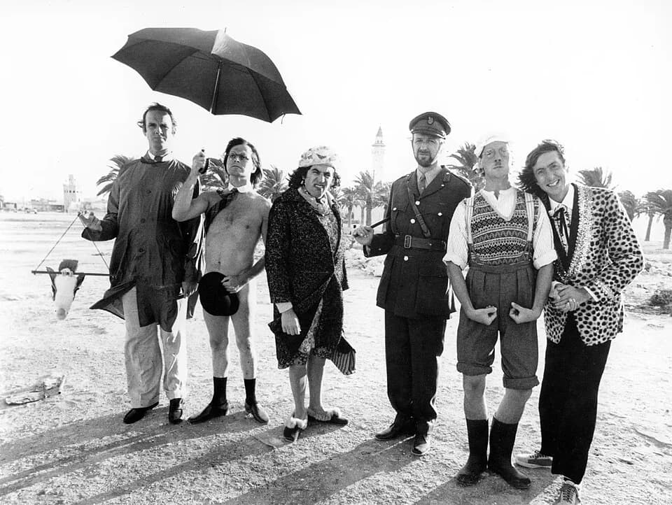 Graham Chapman - Publicity photo of all six members of Monty Python in Monastir, Tunisia, 1978 (left to right): John Cleese, Terry Gilliam, Terry Jones, Graham Chapman, Michael Palin and Eric Idle.