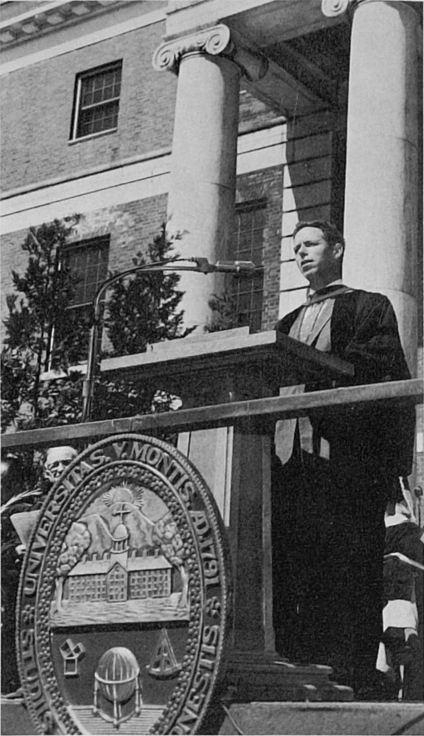 Alan Watts - Alan Watts delivering his speech "Faith Beyond Belief" during the morning baccalaureate service to new graduates in the 154th commencement program at the University of Vermont.  He is wea