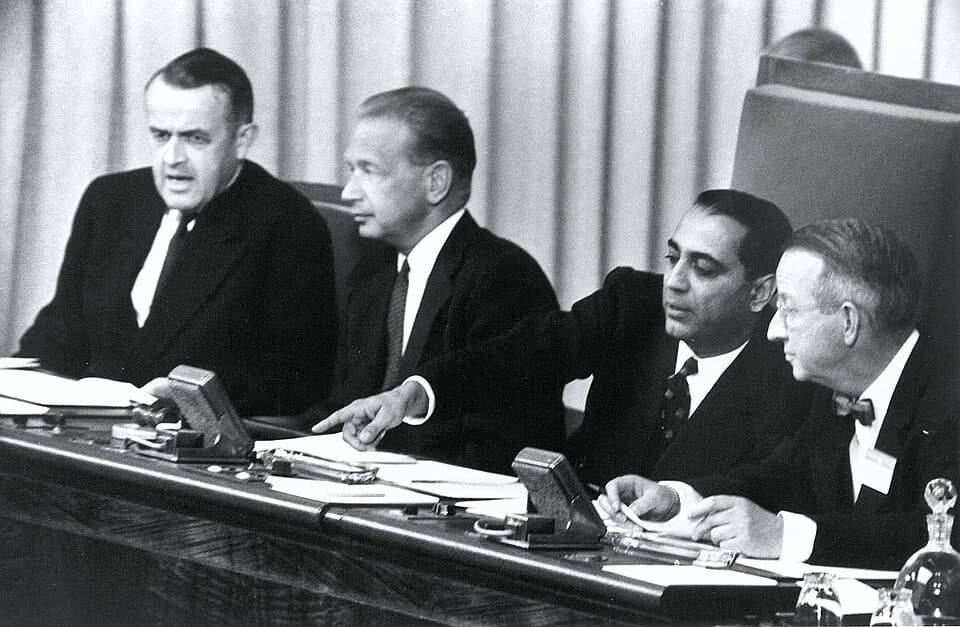Homi Jehangir Bhabha - Seen here (left to right), at the rostrum of the Palais des Nations' Assembly hall for the opening of the International Conference on Peaceful Uses of Atomic Energy: Mr. Max Pet