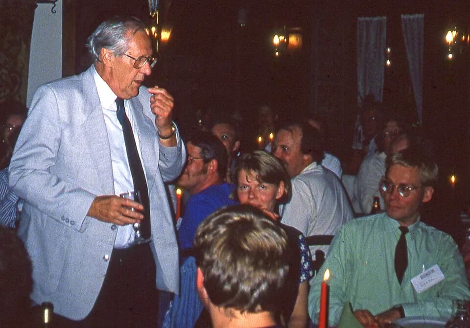 Brian Aldiss - Brian Aldiss to the left (standing). Science fiction convention Intercon, 1994.