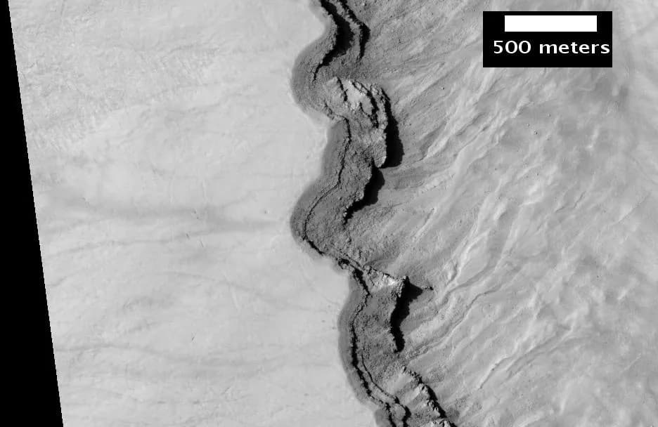 Isaac Asimov - Close-up of Asimov layers showing shadow of overhangs, as seen by hirise.  Location is 47.1 S and 4.2 E.
