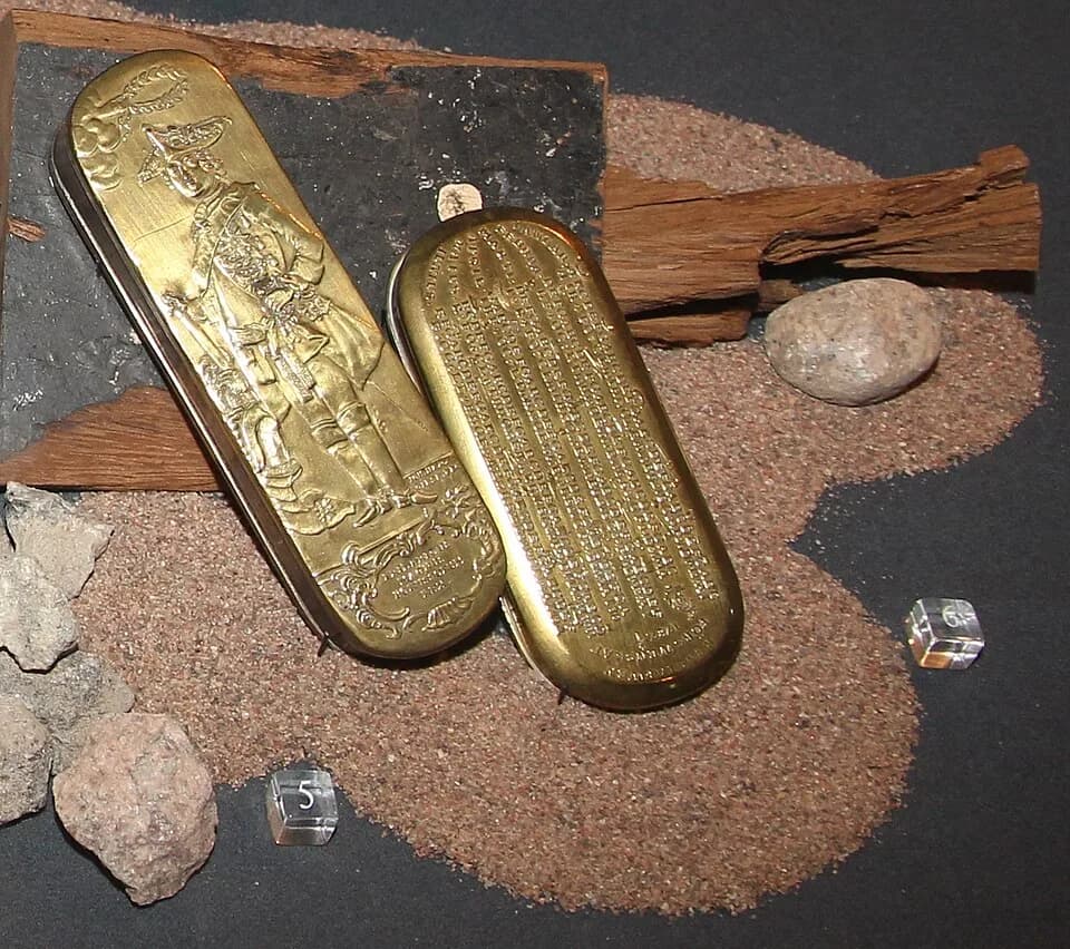 Frederick II of Prussia - Brass tobacco box (left) from Germany and a brass calendar box from Skultuna, Sweden from 1787 in Forum Marinum maritime museum.