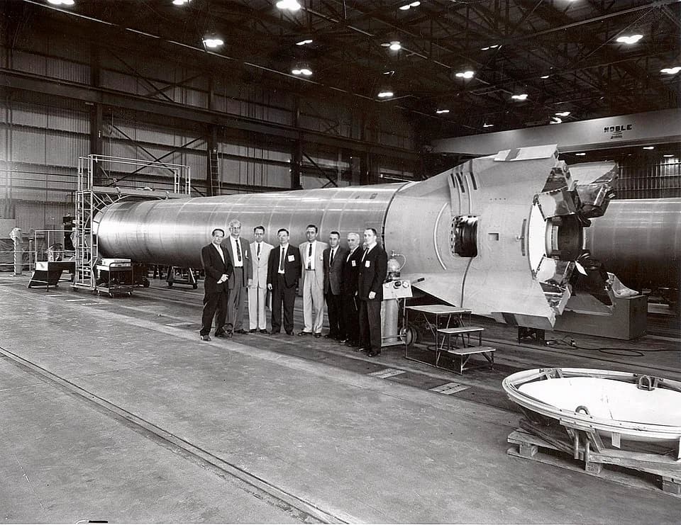 Gus Grissom - A group of officials standing before a Mercury-Redstone booster at the Marshall Space Flight Center (MSFC). Among those in the photograph are:
Joachim Kuettner, who managed responsibilit