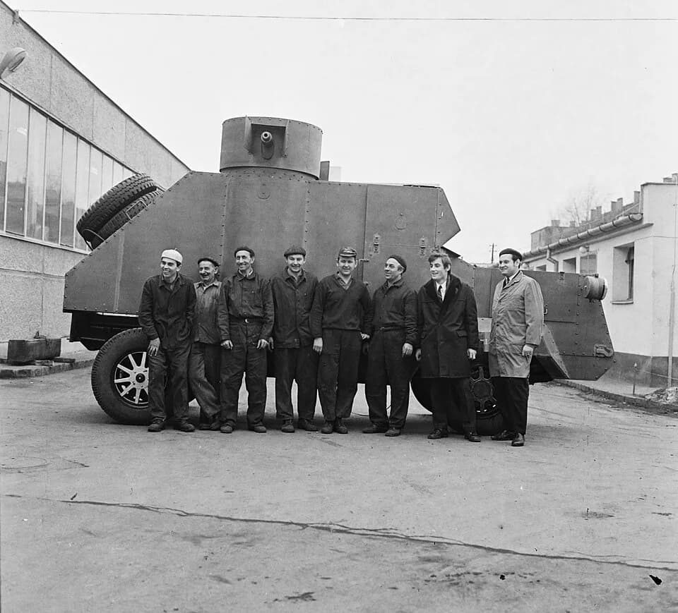 Vladimir Lenin - Portrait photographs of Csepel Automobile factory's workers group. They made a replica of Vladimir Lenin's armored car (see behind the group)