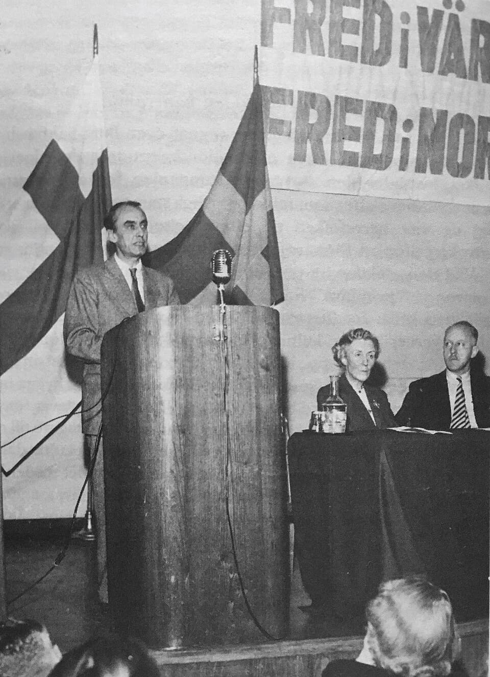 Halldór Laxness - Professor Mogens Fog, former leader of the Danish resistance movement, on the rostrum at a Nordic peace conference in Stockholm. Pictured on the right is M.D. Andrea Andreen, Chairwo