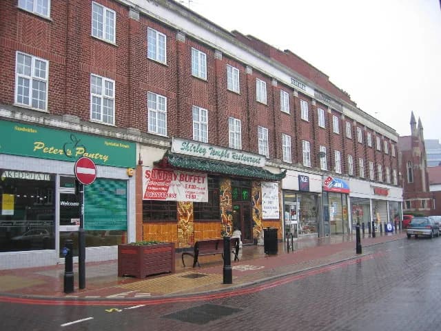 Shirley Temple - Shirley Temple, Shirley. On one of the rows of shops lining the Stratford Road in Shirley as is passes through this square.