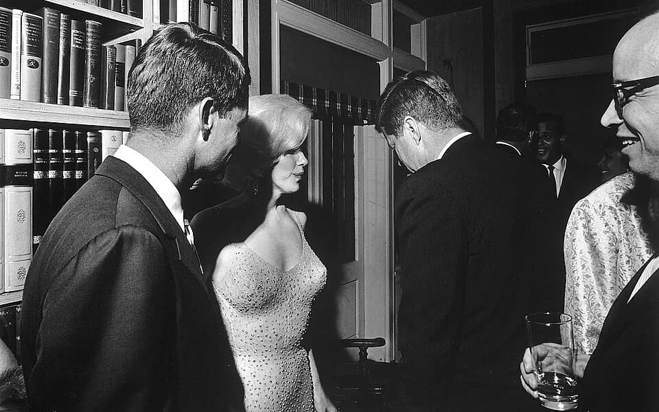 Harry Belafonte - U.S. President John F. Kennedy (with his back to the camera), U.S. Attorney General Robert Kennedy (far left), and actress Marilyn Monroe, on the occasion of President Kennedy's 45th