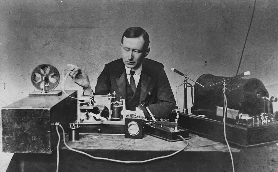 Guglielmo Marconi - Electrical engineer/inventor Guglielmo Marconi with the spark-gap transmitter (right) and coherer receiver (left) he used in some of his first long distance radiotelegraphy transmi