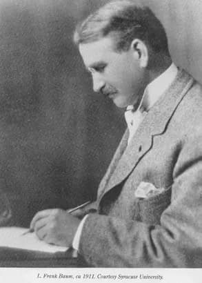 L. Frank Baum - Writer L. Frank Baum, writing with pen.
