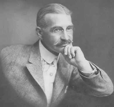 L. Frank Baum - Photoportrait of writer L. Frank Baum, wearing pince-nez eyeglasses, moustache, with hand on chin