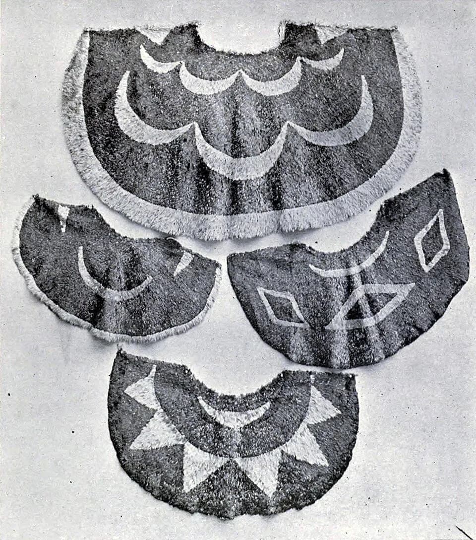 Victoria - Capes in Windsor Castle, Memoirs Bishop Museum, Vol. I, Plate XIV. Capes in Her Majesty's collection at Windsor Castle (Nos. a=21, b=87, c=86, d=85). Photographed by Russell &amp; Co.