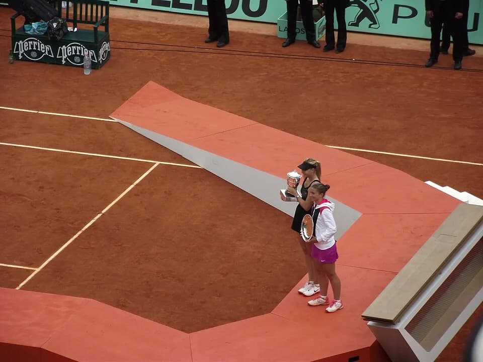 Suzanne Lenglen - Italian Sara Errani &amp; Russian Maria Sharapova at 2012 French Open.

2012 Roland Garros, Paris, France.