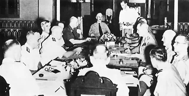 Archibald Wavell, 1st Earl Wavell - American - British -Dutch - Australian command (ABDACOM) meeting with General Wavell for the first time. Seated around the table, from left: Admirals Layton, Helfri