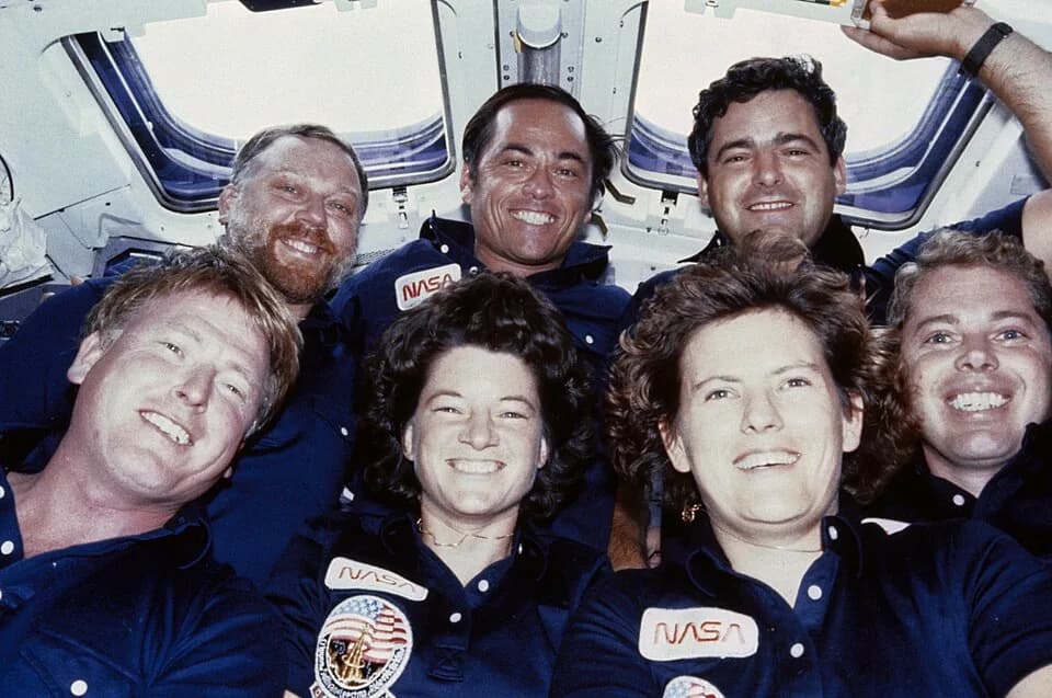 Sally Ride - STS 41-G crew photo taken on the flight deck of the Challenger during the flight. Front row (l.-r.) Jon A. McBride, pilot; Sally K. RIde, Kathryn D. Sullivan and David C. Leestma, all mis