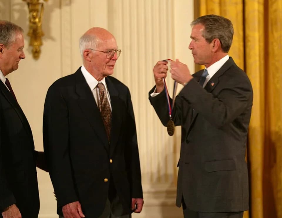 Raymond Davis Jr. - Raymond Davis, Jr. receives the Medal of Science from President Bush, with OSTP Director Marburger looking on.