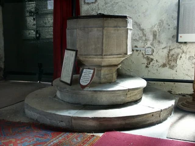 John Wesley - Interior of St Andrew, Epworth John and Charles Wesley and other members of the Wesley family were baptised in this font. The picture standing to the left of the font shows John Wesley's