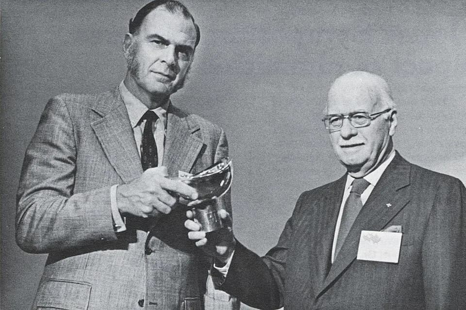 F. Sherwood Rowland - Dr . F. Sherwood Rowland (left), the College of Science's first John Wiley Jones Distinguished Lecturer, receives a silver bowl from Mr. Jones. The bowl was created by Hans Chris