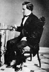 Paul Morphy - PaulMorphySittingLookingChessboard.jpg
