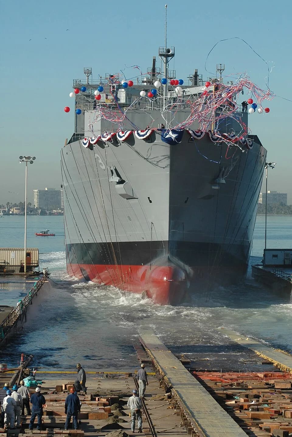 Alan Shepard - San Diego (Dec. 6, 2006) — After officially christening the newest resupply ship, Military Sealift Command (MSC) advanced auxiliary dry cargo/ammunition ship USNS Alan Shepard (T-AKE-3)