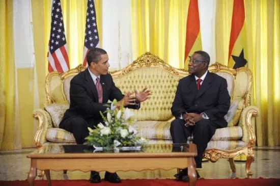 John Evans Atta Mills - US President Barack Obama speaks with Ghanaian President John Atta Mills during a meeting at the Presidential Castle in Accra, Ghana 11 July 2009.