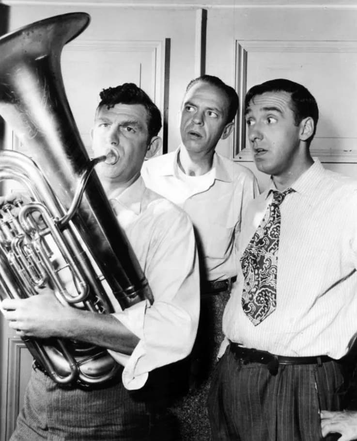 Don Knotts - Publicity photo of Andy Griffith, Don Knotts and Jim Nabors from The Andy Griffith Show.  Andy tries to help out the town band, but Barney and Gomer aren't so sure he's helping them. The 