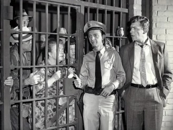 Don Knotts - Photo from the television program The Andy Griffith Show.  When Andy returns from a trip, he finds that Barney has managed to put all of Mayberry's citizens behind bars in the town jail.