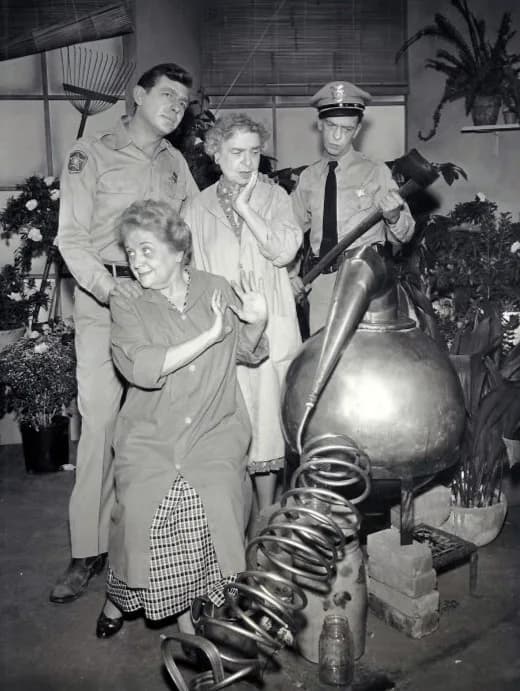 Don Knotts - Photo from the television program The Andy Griffith Show.  Andy and Barney (Don Knotts) discover that two spinsters (Charity Grace and Gladys Hurlbut) are running a still at their home.