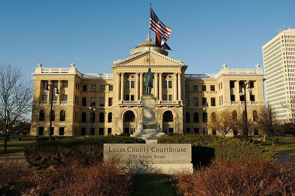 William McKinley - Lucas County Courthouse in Toledo, Ohio showing signage and statute of William McKinley.
